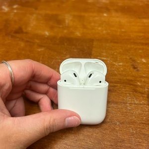 Airpods- Both headphones with case!